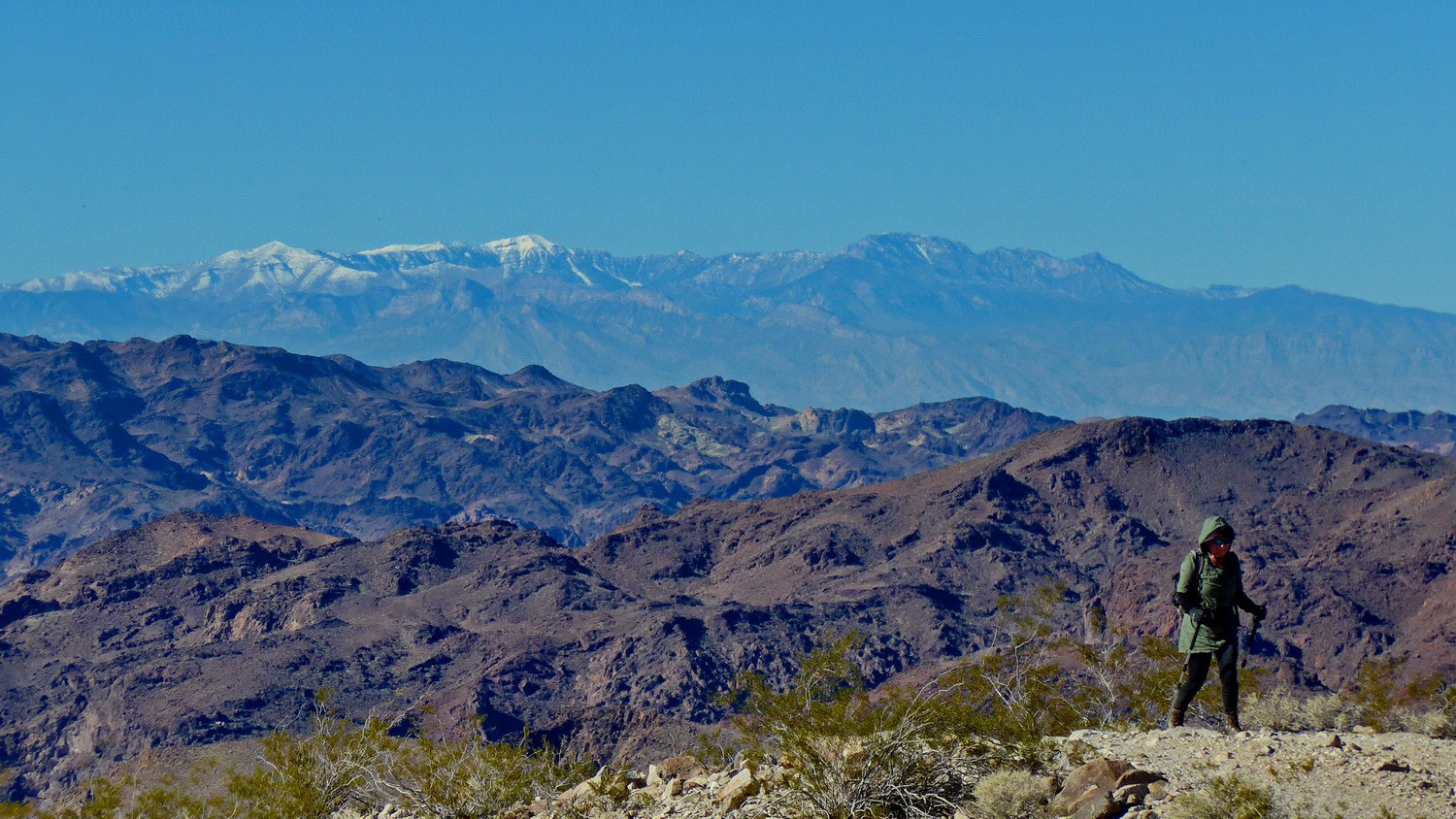 Snowy Spring Mountains seen from the way to the Lookout Kingman Wash